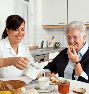 senior care worker with client